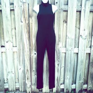Bebe Turtle Neck Jumpsuit SMALL Black Sleeveless